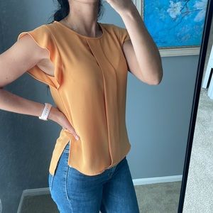 In new condition zara blouse in mango color